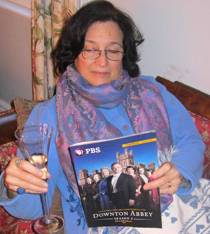 Nancy thayer reading an article about Downton Abbey