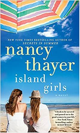 Cover of island Girls. Two women sitting on a beach under a colorful umbrella. 
